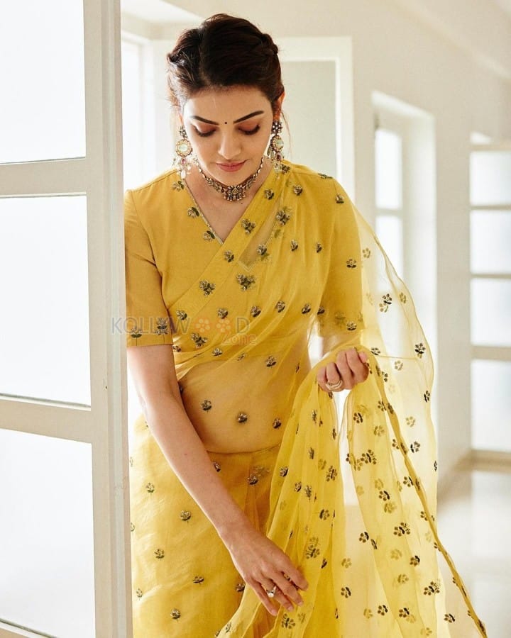 Graceful Kajal Aggarwal in a Bright Yellow Embellished Saree Pictures 09