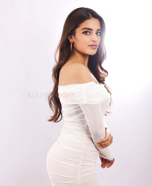 Heroine Nidhi Agerwal in an Off Shoulder Bodycon Dress for Tulip Magazine Photoshoot Pictures 03