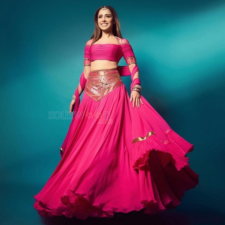 Hot Nushrratt Bharuccha in a Manish Gharat Pink Chiffon Lehenga Photos 01