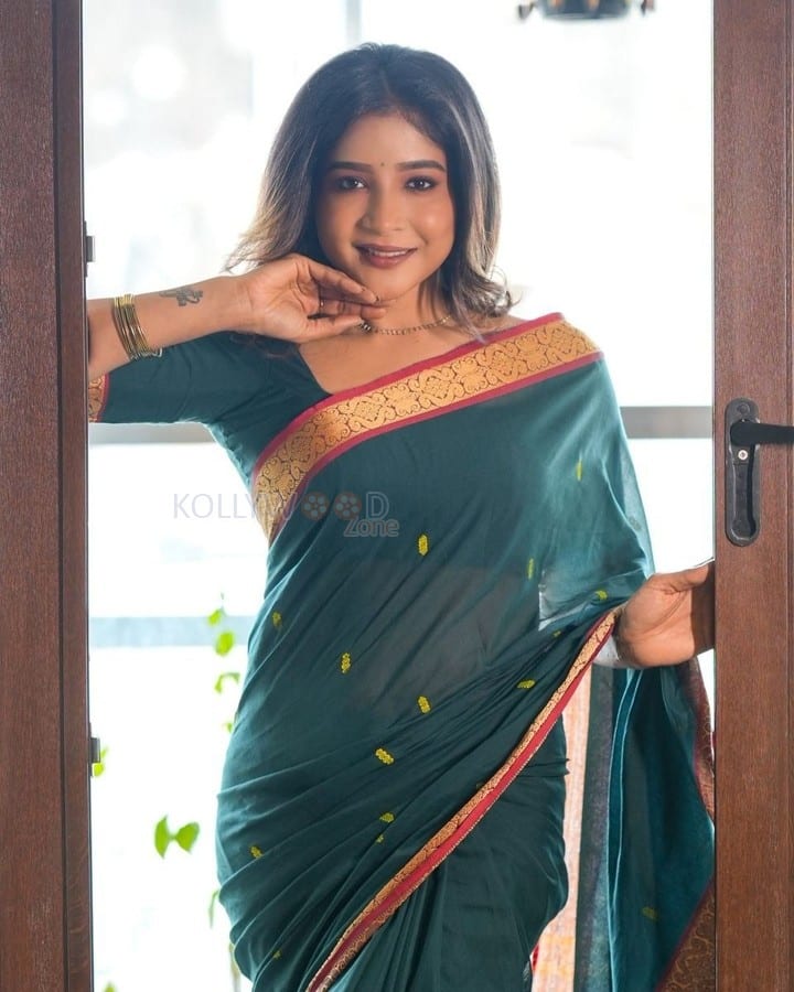 Indian Actress Sakshi Agarwal in an Emerald Green Silk Saree Pictures 03