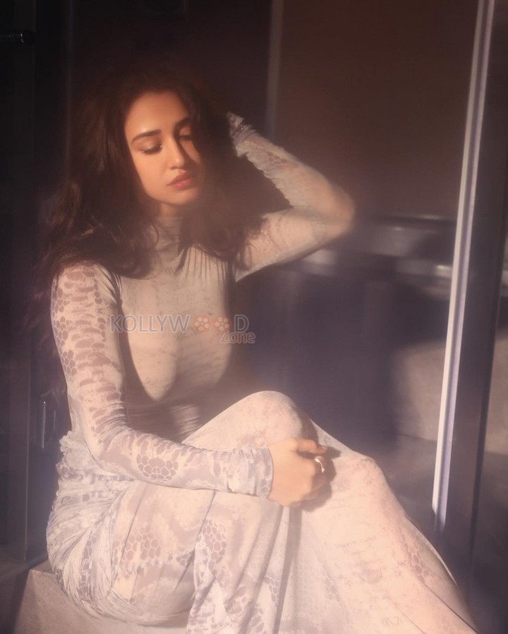 Kanguva Actress Disha Patani in a Full Length White Dress Photos 02