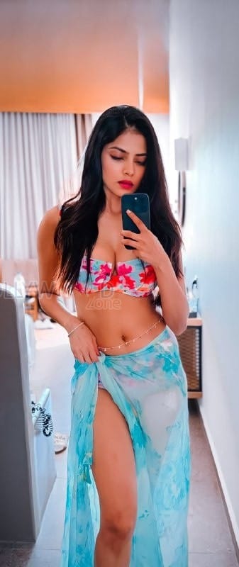 Mallu Hottie Malavika Mohanan in a Floral Bikini Pictures 02