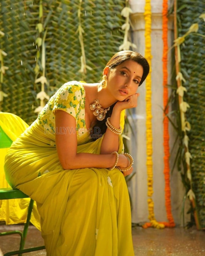 Matka Movie Actress Nora Fatehi in a Floral Lime Green Saree Photos 03