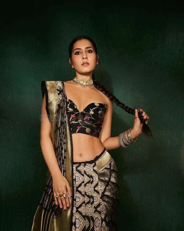 Most Popular Face of the Year Raashii Khanna in a Black Silk Saree with an Off Shoulder Cleavage Blouse Photos 01