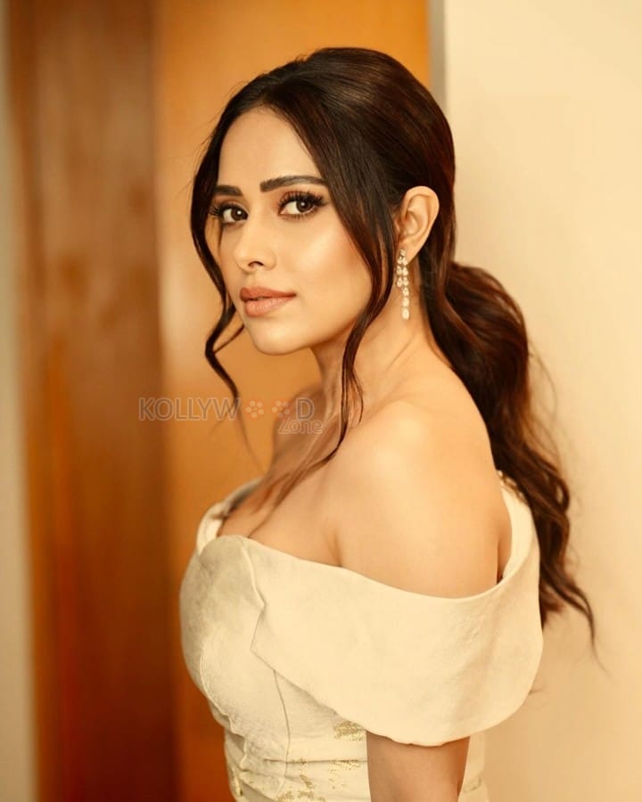 Nushrratt Bharuccha in a Golden Off Shoulder Sheath Dress Pictures 08