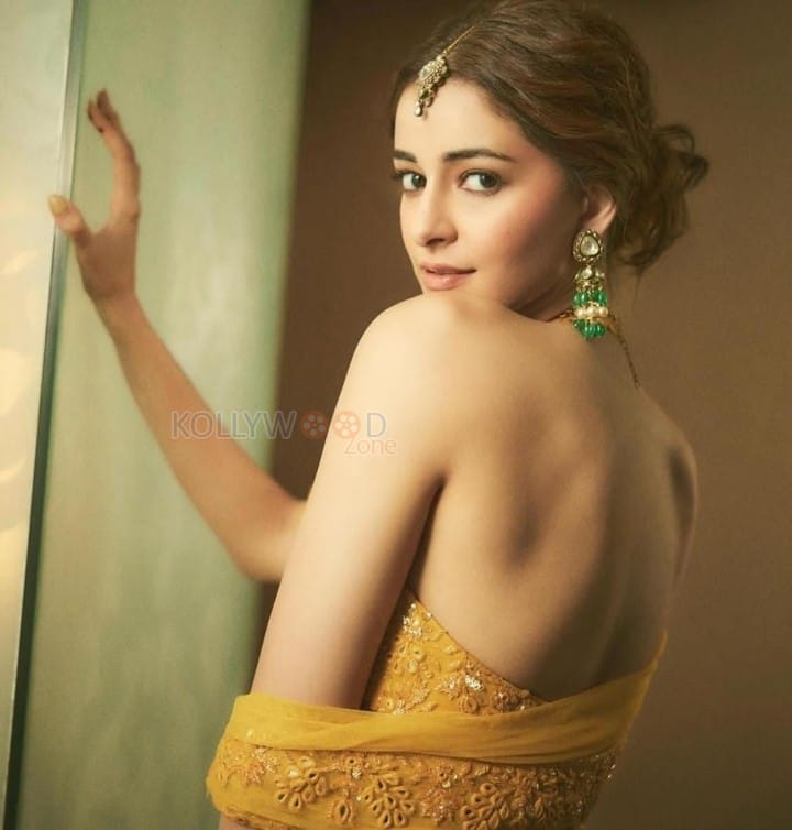 Petite Beauty Ananya Panday in a Yellow Lehenga with Halter Neck Blouse Pictures 01