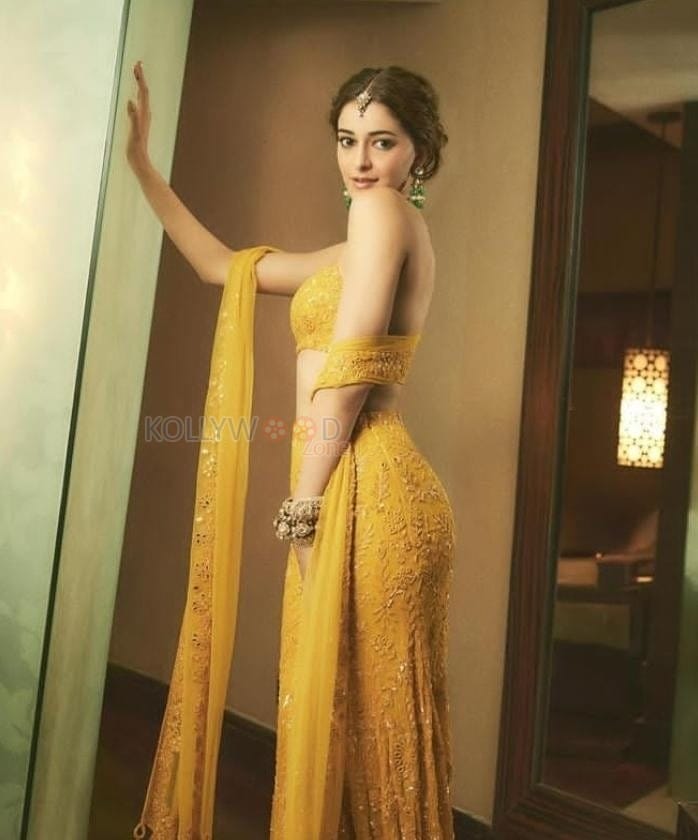 Petite Beauty Ananya Panday in a Yellow Lehenga with Halter Neck Blouse Pictures 02