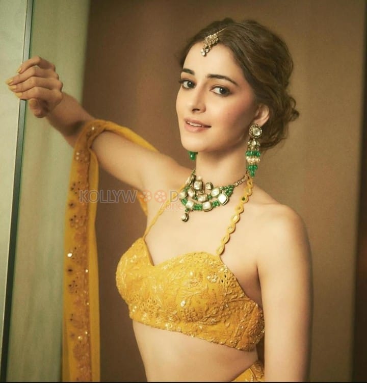 Petite Beauty Ananya Panday in a Yellow Lehenga with Halter Neck Blouse Pictures 03