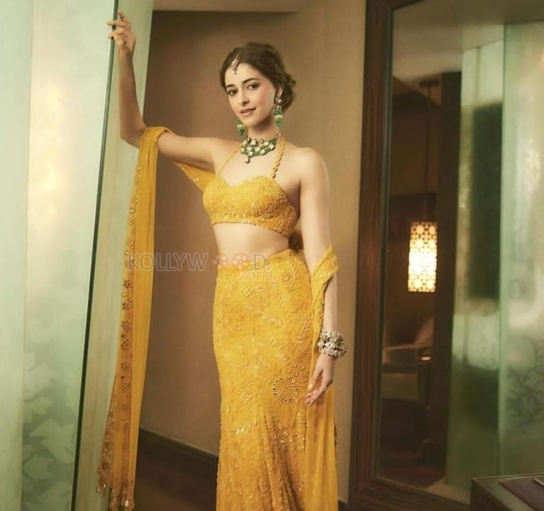 Petite Beauty Ananya Panday in a Yellow Lehenga with Halter Neck Blouse Pictures 04