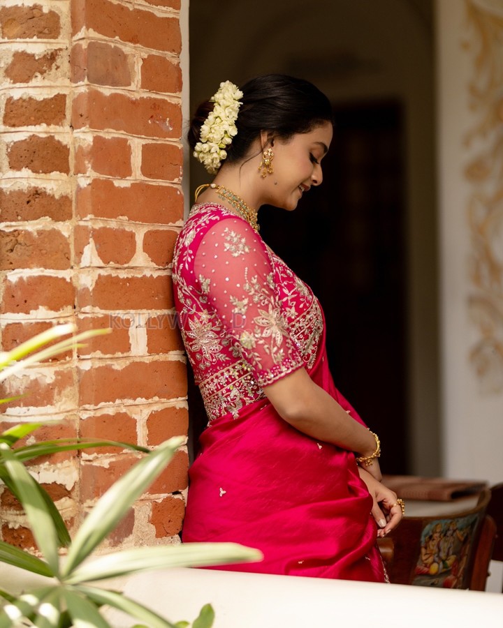 Radiant Beauty Keerthy Suresh in a Traditional Red Saree Photos 01