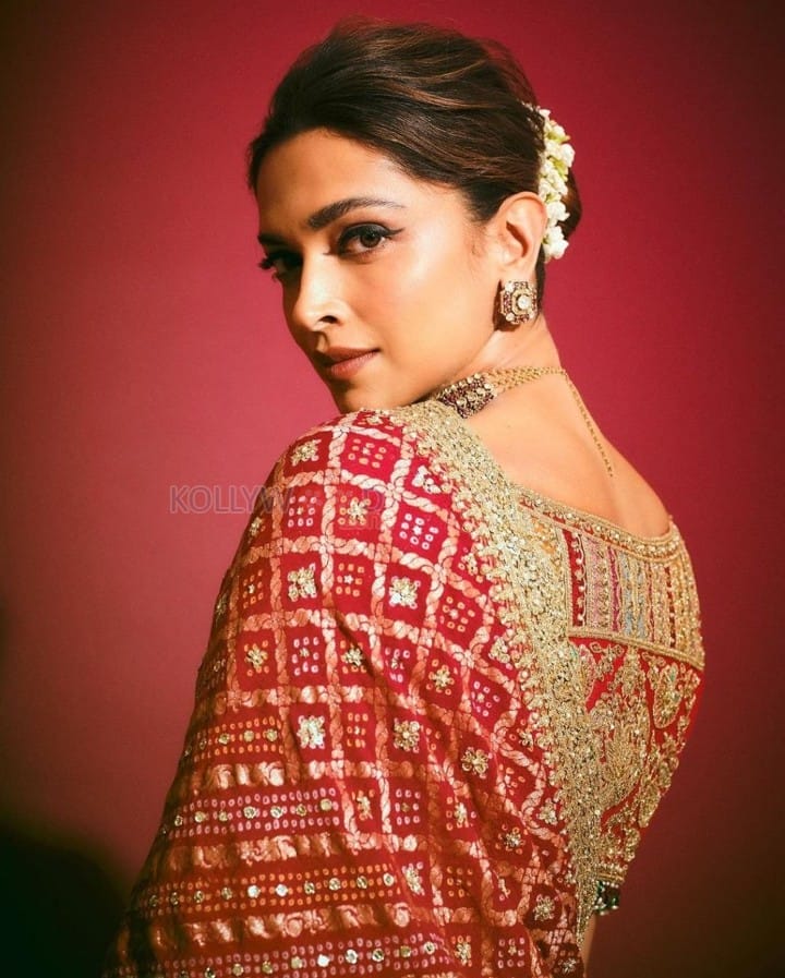 Radiating Beauty Deepika Padukone in a Red Bandhani Saree at Anant Ambani Pre Wedding Bash Pictures 01