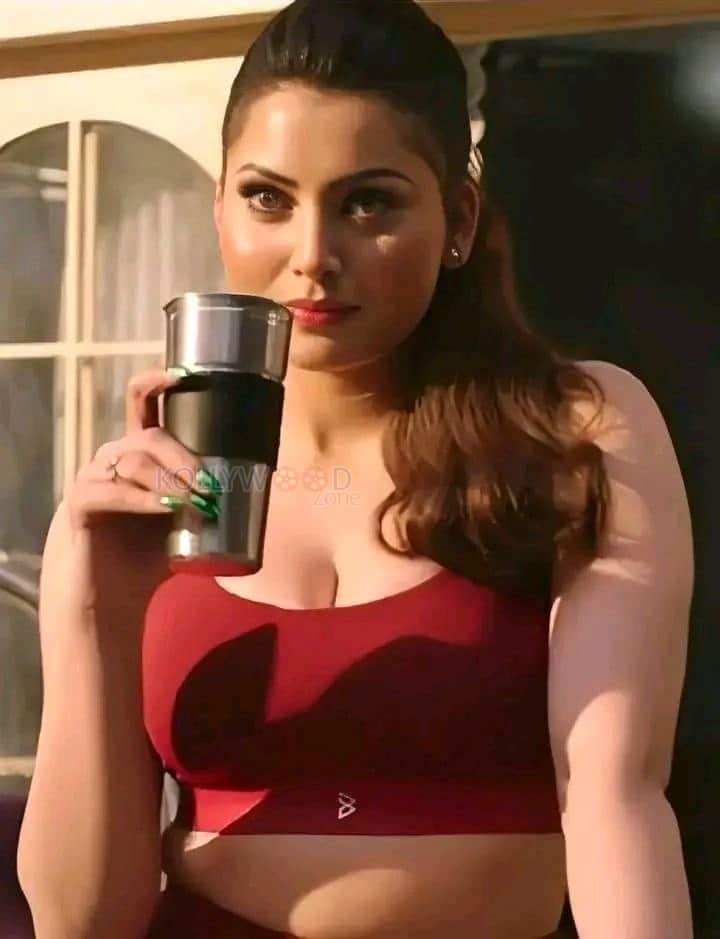 Sensual Urvashi Rautela in a Red Gen X Sports Bra Pictures 03