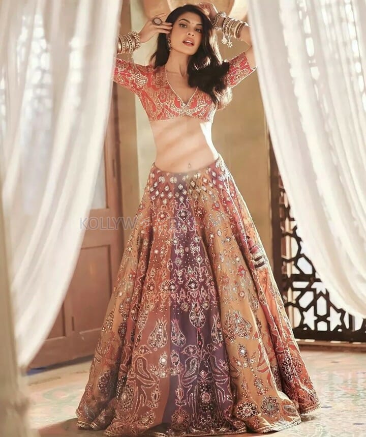 Sexy Jacqueline Fernandez showing navel in a Traditional Lehenga Photoshoot Stills 04