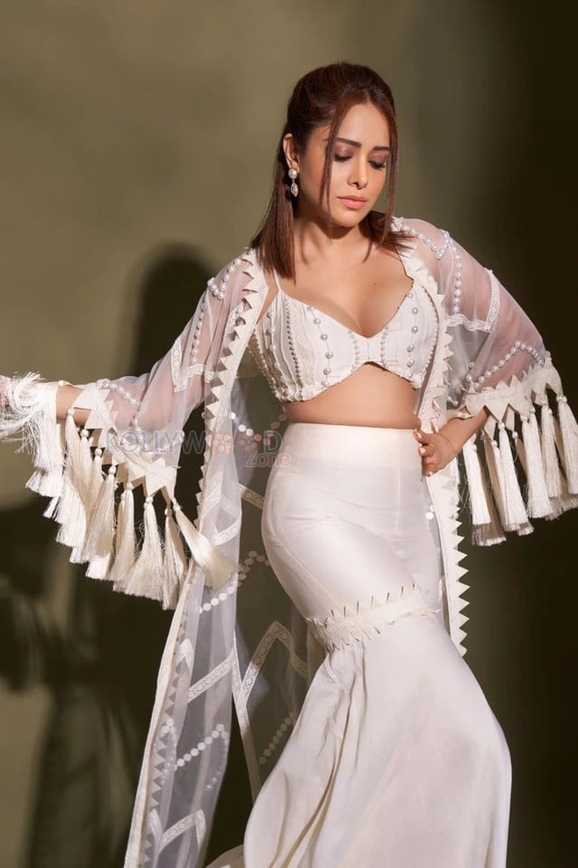 Sexy Nushrratt Bharuccha in a Vanilla Fringe Cape Sharara Photos 03