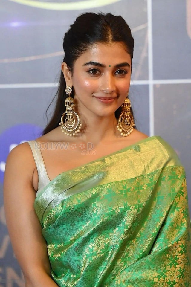 Sexy Pooja Hegde in a Sleeveless Green Silk Saree Photos 01