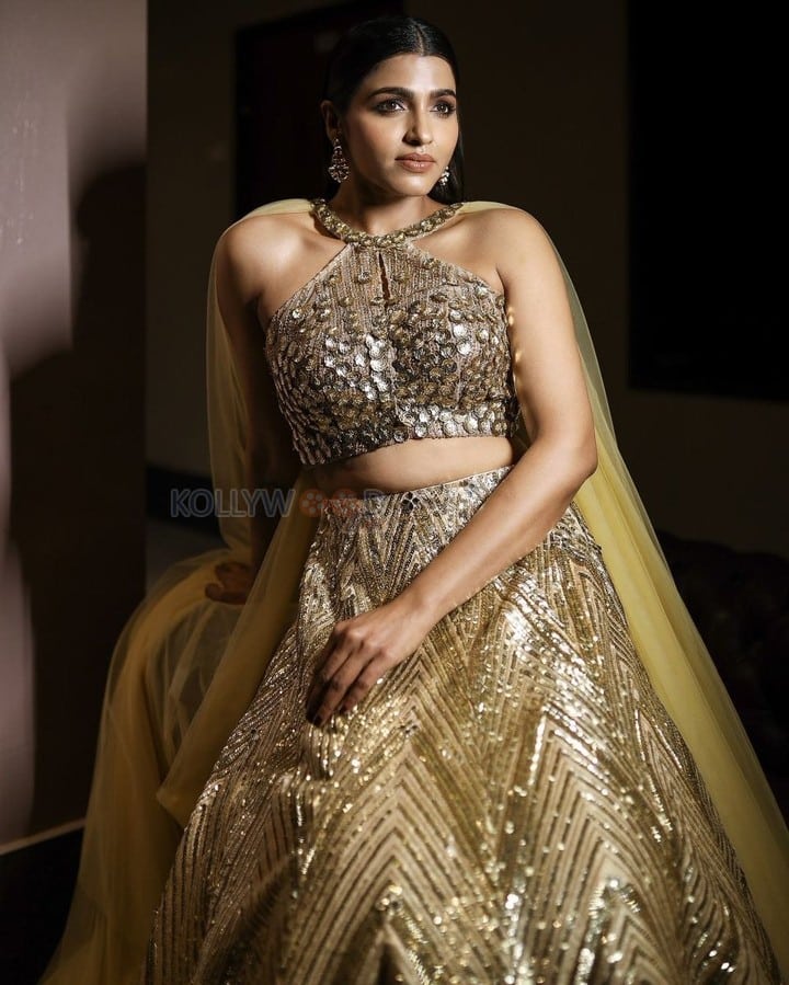 South Actress Sai Dhanshika in a Golden Lehenga Photos 02