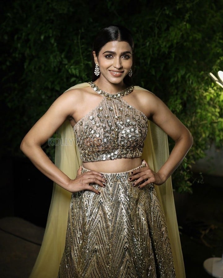 South Actress Sai Dhanshika in a Golden Lehenga Photos 04