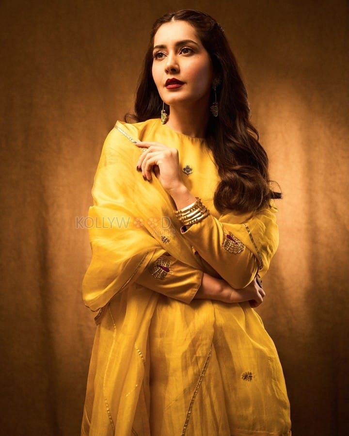 Sparkling Beauty Raashi Khanna in a Vibrant Yellow Kurta Set Photos 08