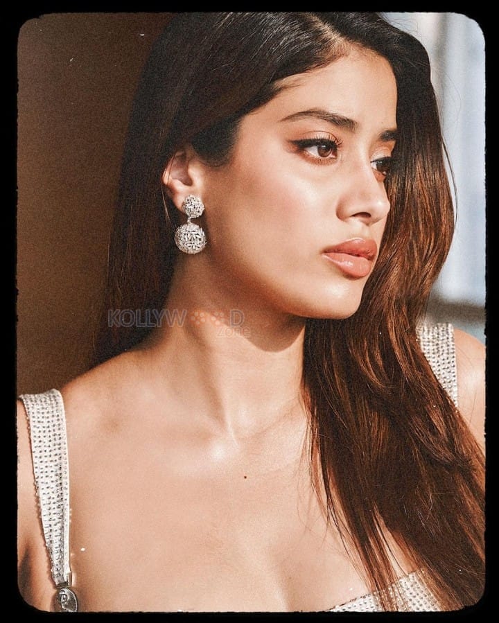 Striking Janhvi Kapoor in a Cricket Themed Silver and Gray Shimmery Bodycon Dress Photos 03