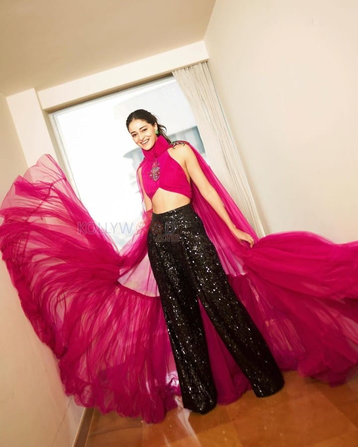 Stunning Beauty Ananya Panday in a Pink and Black Halter Neck Top with Black Shimmery Pants Pictures 08