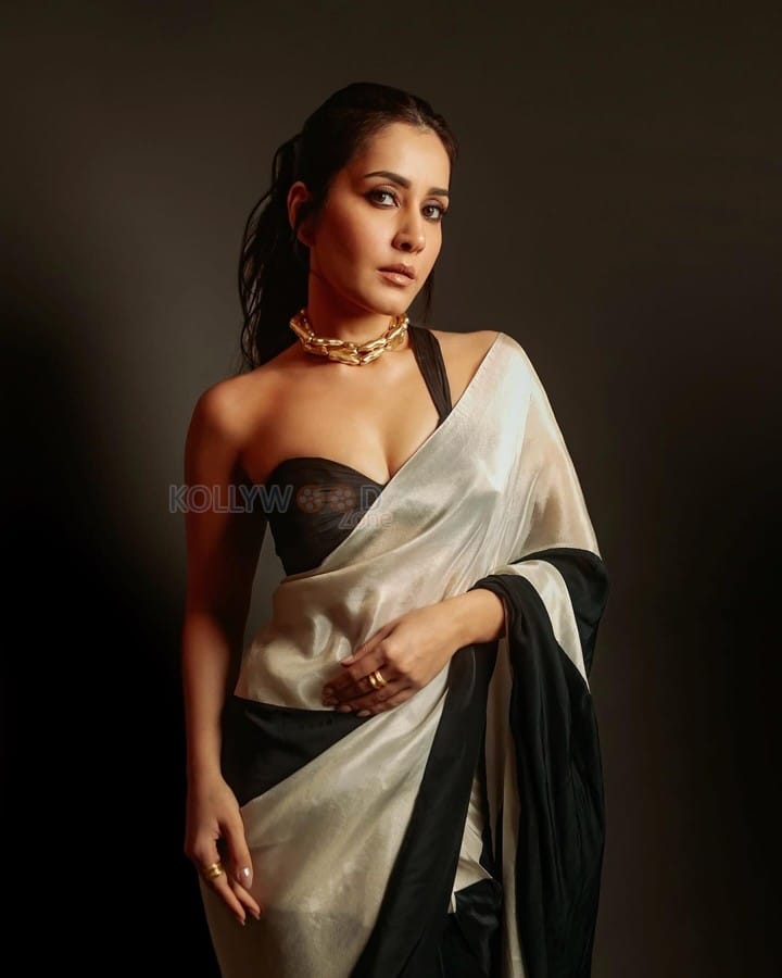 Stunning Beauty Raashi Khanna in a Black and White Saree with an One Shoulder Blouse Photos 01