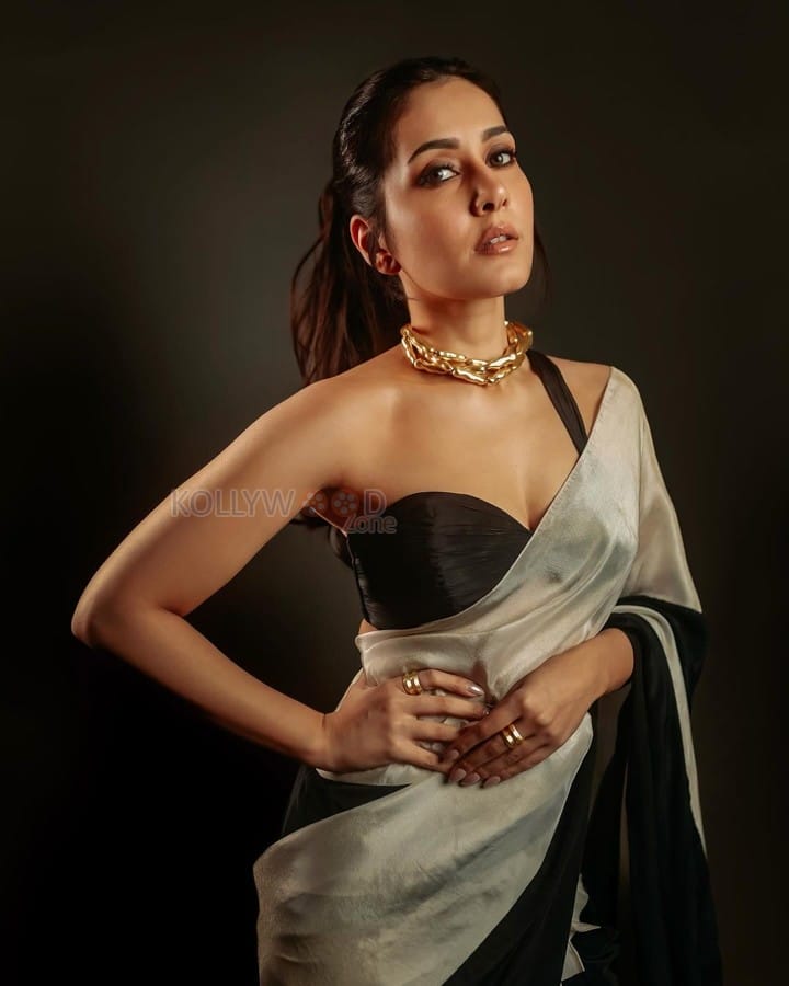 Stunning Beauty Raashi Khanna in a Black and White Saree with an One Shoulder Blouse Photos 08