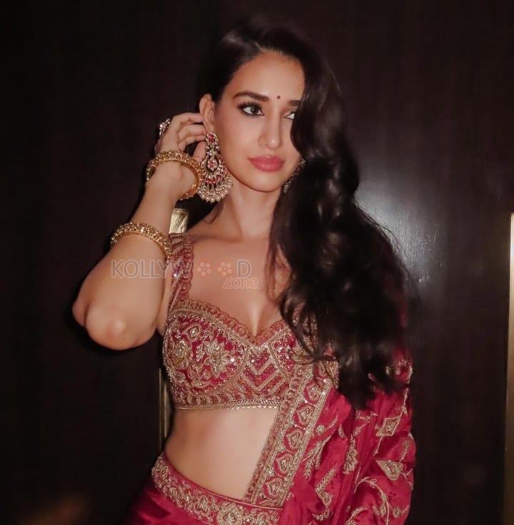 Stunning Disha Patani in a Red Saree with a Bralette Blouse Pictures 02