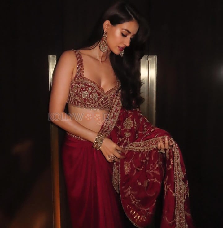 Stunning Disha Patani in a Red Saree with a Bralette Blouse Pictures 03