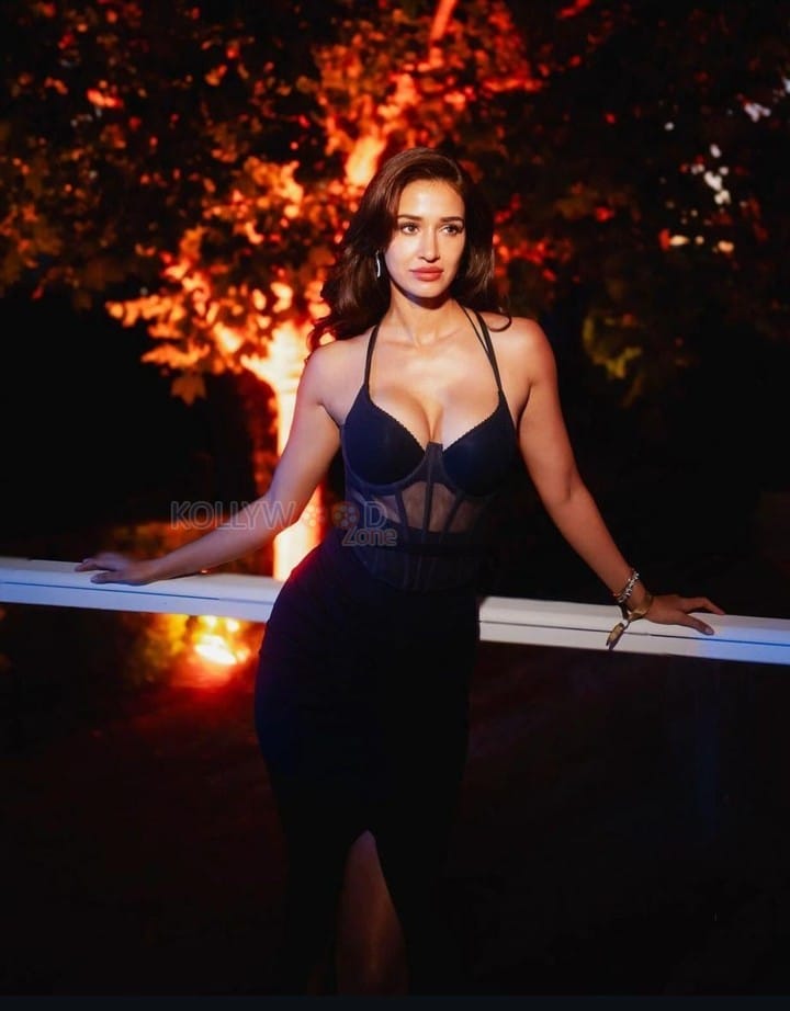 Stunning Figure Disha Patani Flaunting her Cleavage in a Black Slit Bodycon Dress Photos 01