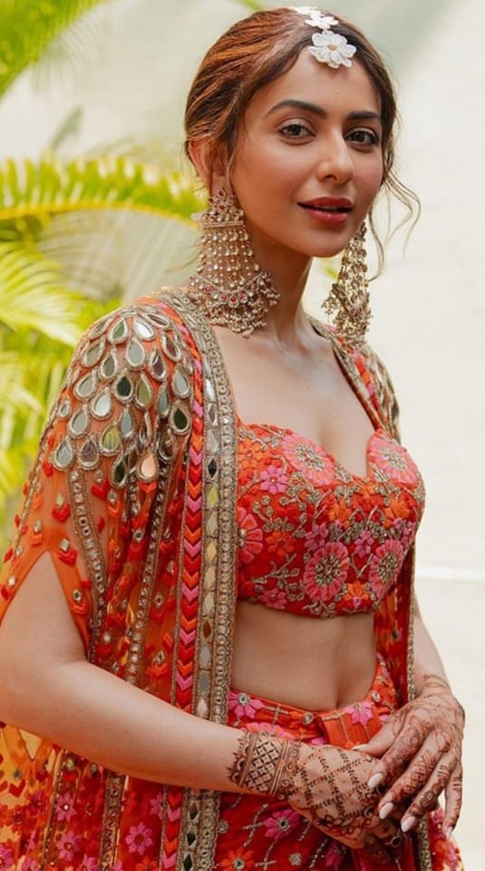 Stunning Rakul Preet Singh in a Orange and Pink Mehendi Lehenga Pictures 02