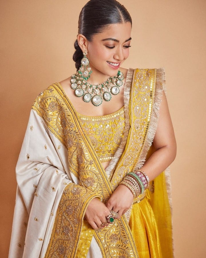 Stunning Rashmika Mandanna in a Yellow Mustard Lehenga at Anant Ambani Radhika Merchant Wedding Pictures 02