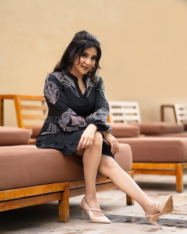 Stylish Sakshi Agarwal in a Black Printed Dress Pictures 03