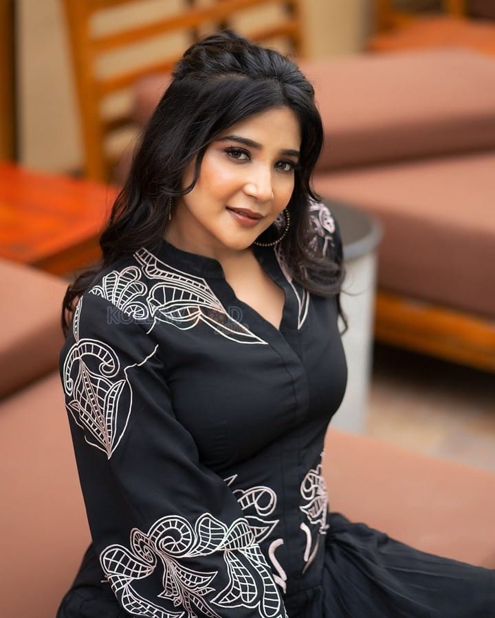 Stylish Sakshi Agarwal in a Black Printed Dress Pictures 05