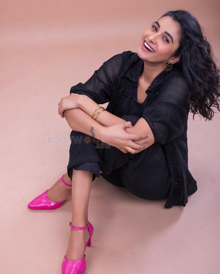 Tamil Actress Priya Bhavani Shankar in a Black Dress with Pink Shoes Photos 04