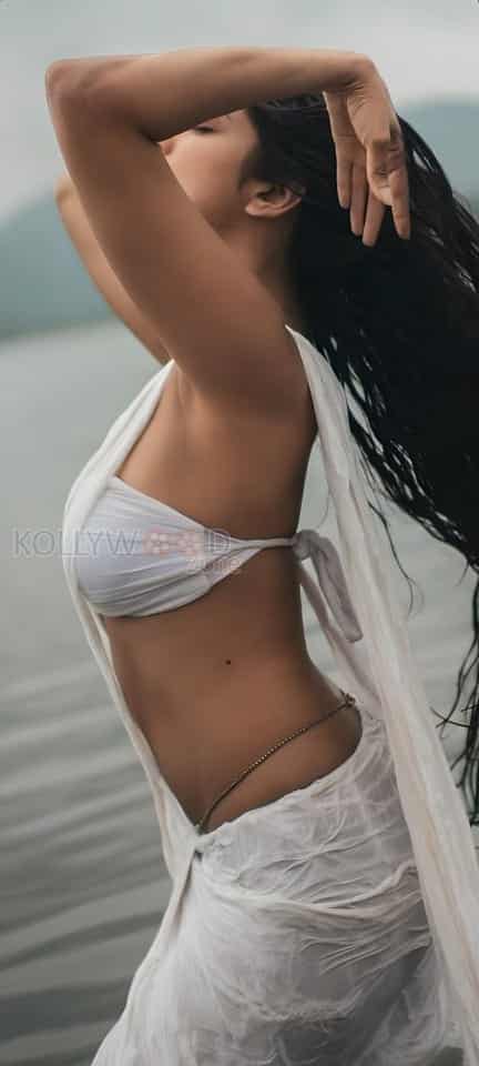 Wet and Wild Malavika Mohanan Hot Photos 03