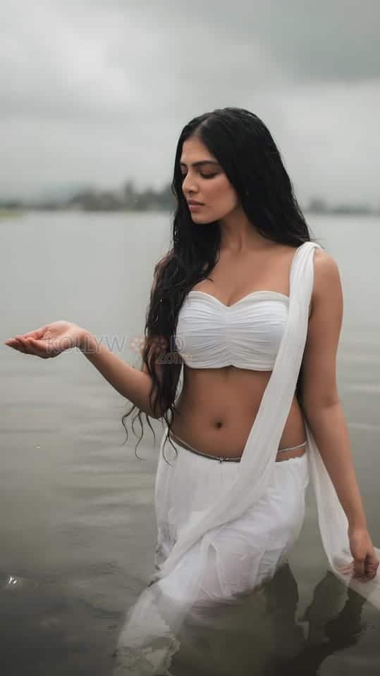 Wet and Wild Malavika Mohanan Hot Photos 09