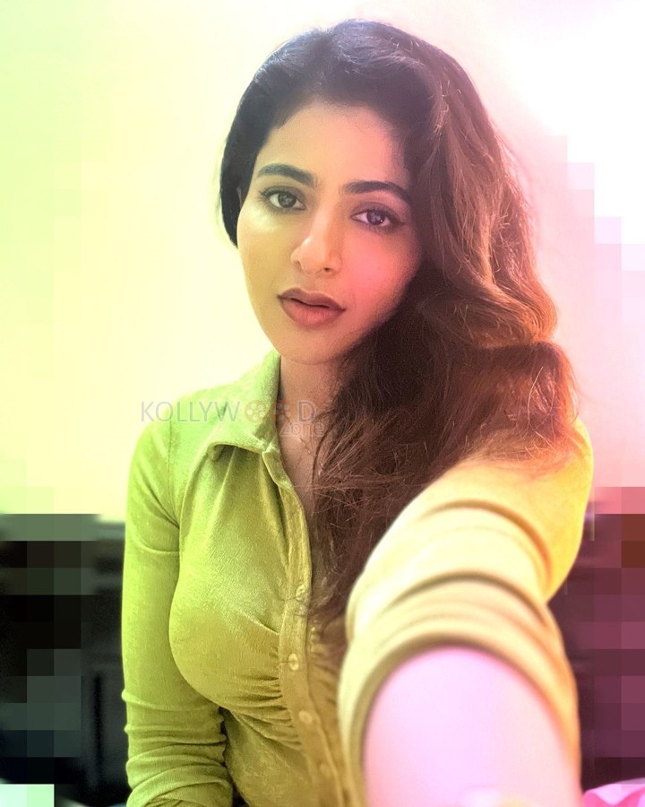 Captivating Iswarya Menon in a Green Shirt Selfie Photos 02