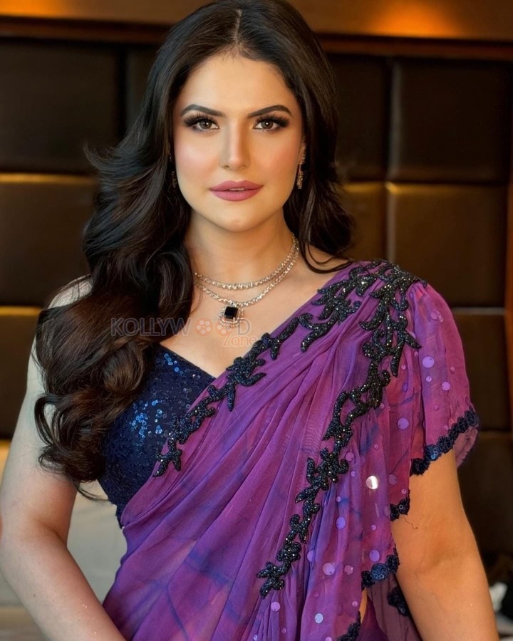 Gorgeous Zareen Khan in a Purple Saree with a Black Sleeveless Blouse Photos 06