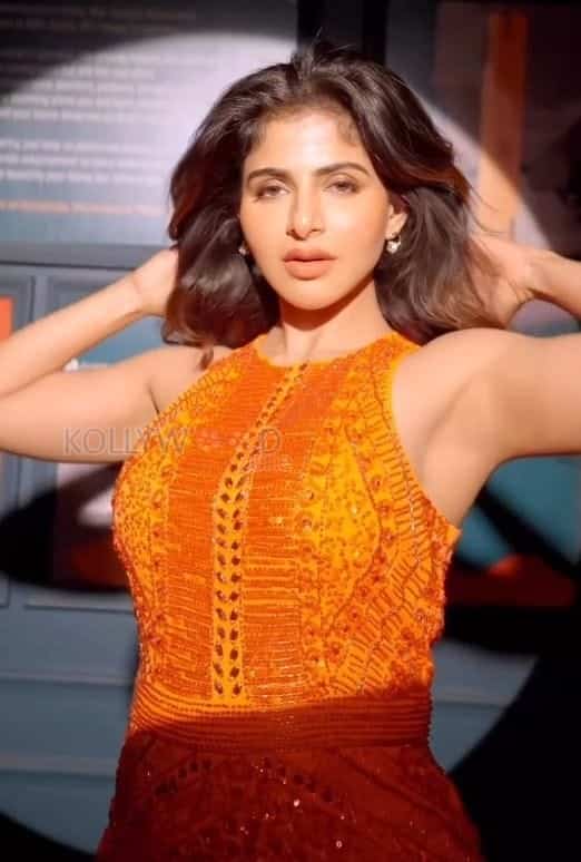 Hottie Ishwarya Menon in an Orange Dress Photos 03