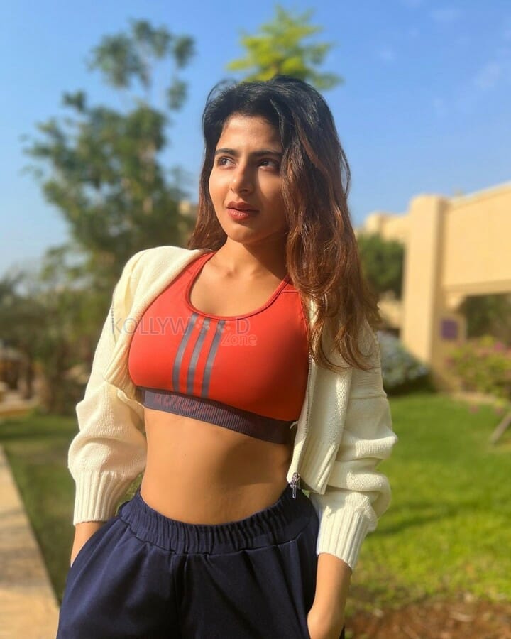 Iswarya Menon in Adidas Red Sports Bra Photos 01