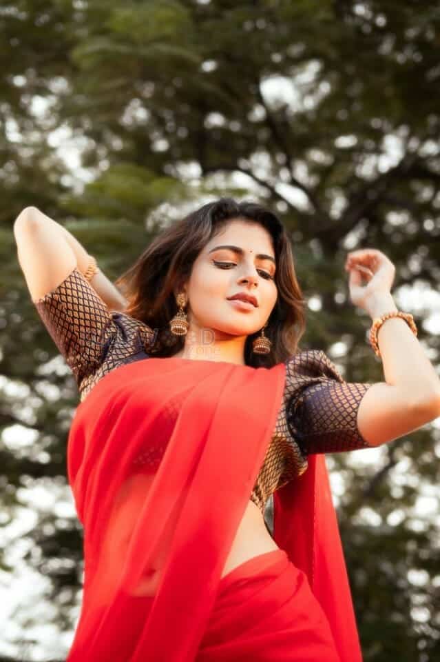 Iswarya Menon in Red Half Saree Photos 01