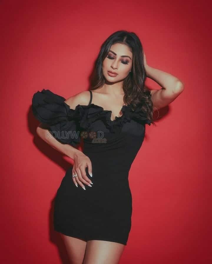 Sexy Mouni Roy In Body Hugging Black Mini Dress Photos 02