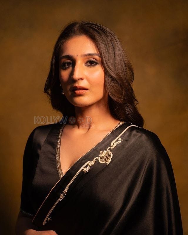 Singer Dhvani Bhanushali in a Black Silk Saree Photos 01