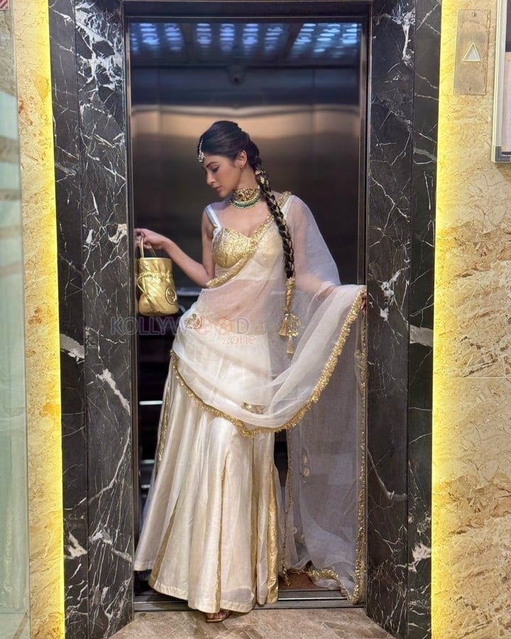 Stunning Mouni Roy in a White and Gold Lehenga Photos 02