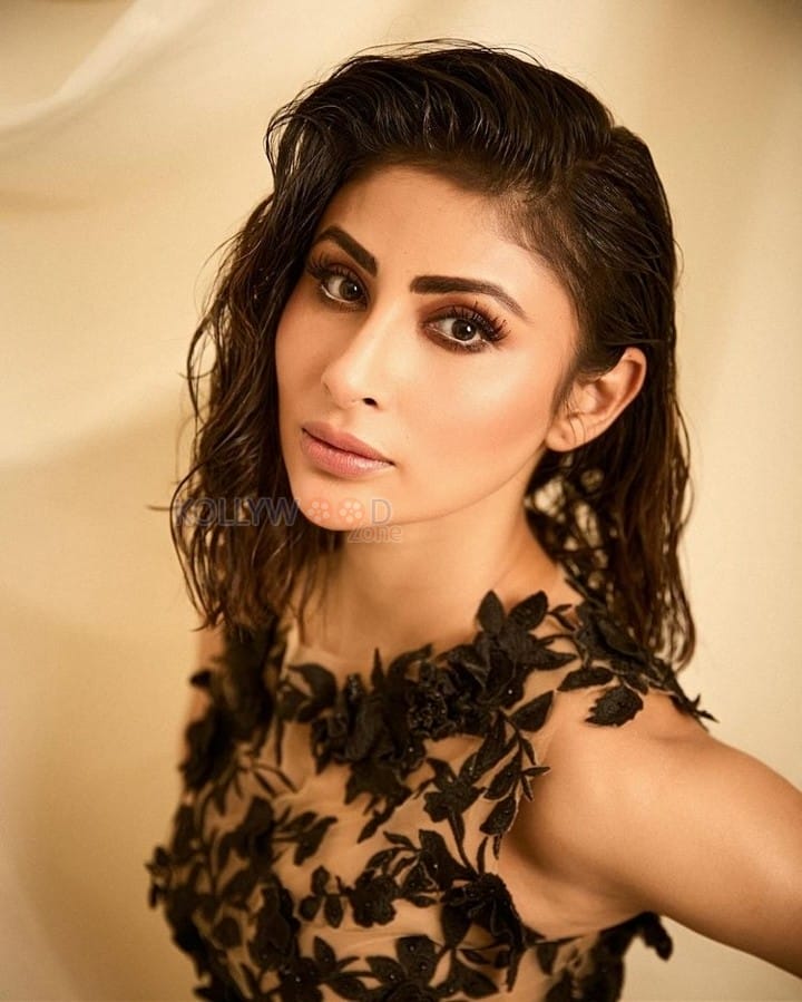 Super Stylish Mouni Roy in a Black Ankle Length Gown with a Front Slit Photos 01