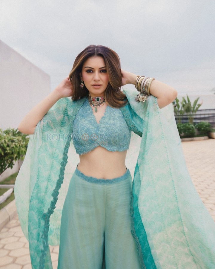 Talented Hansika Motwani in a Pastel Blue Lehenga with a Shrug Dupatta Photos 03