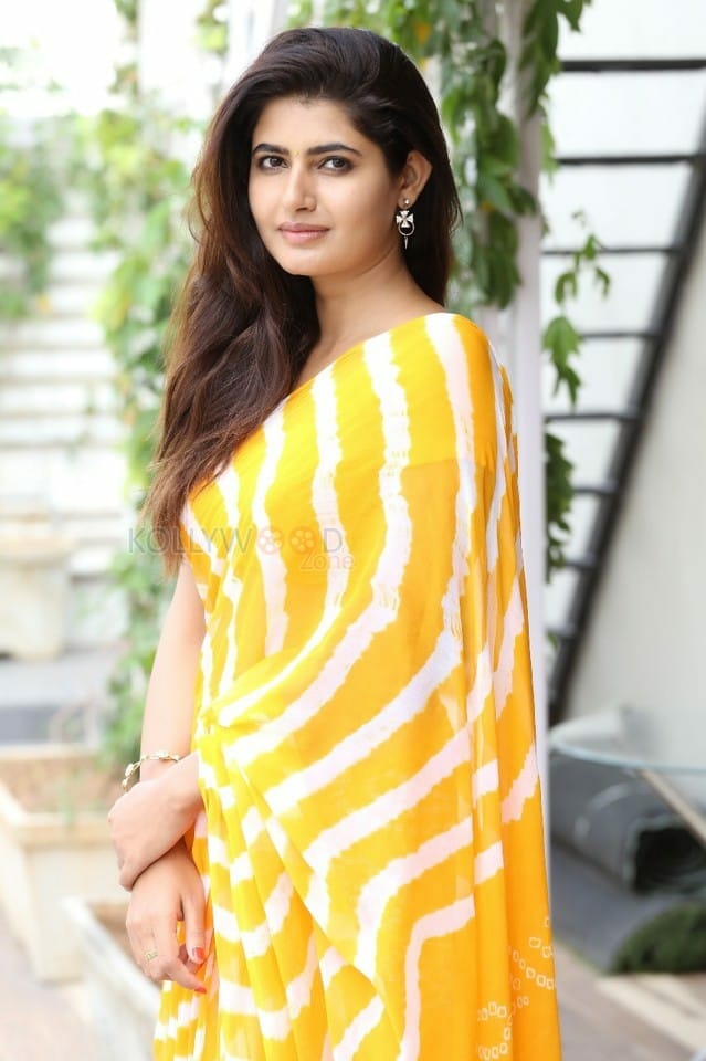 Actress Ashima Narwal Yellow Saree Photoshoot Pictures