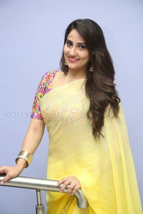 Actress Manjusha Yellow Saree Photos