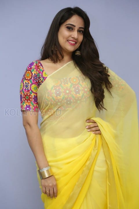 Actress Manjusha Yellow Saree Photos