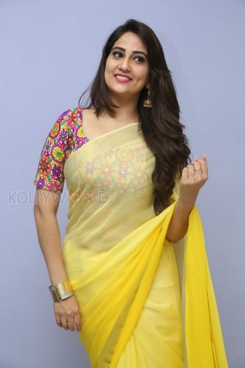 Actress Manjusha Yellow Saree Photos